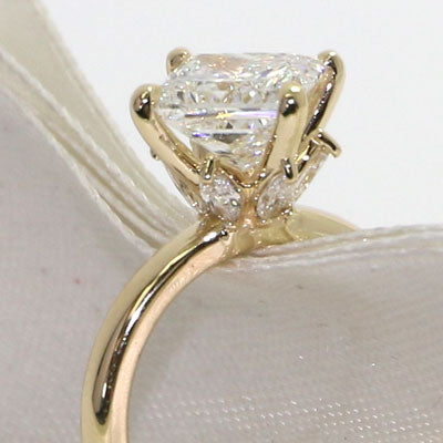 custom east west north south ring in yellow gold, 2ct princess cut diamonds and accent marquise diamonds 